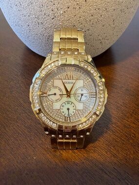 GUESS Gold Tone Crystal Accented Bracelet Watch